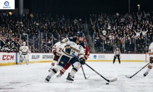 Ice Hockey Quotes featuring a player skating during an intense hockey game.