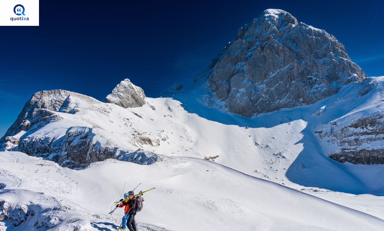 Mountain and snow skiing quotes with a skier on a snow-covered mountain.